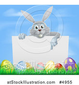 Vector Illustration of a Gray Bunny Rabbit Pointing down to a Sign with Grass and Easter Eggs by AtStockIllustration