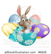 Vector Illustration of a Happy Brown Easter Bunny Sitting in an Egg Shell by AtStockIllustration