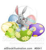 Vector Illustration of a Happy Gray Easter Bunny Sitting in an Egg Shell by AtStockIllustration