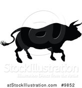 Vector Illustration of a Silhouetted Black Bull by AtStockIllustration