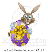 Vector Illustration of a Smiling Brown Bunny Hugging a Polka Dot Easter Egg by AtStockIllustration