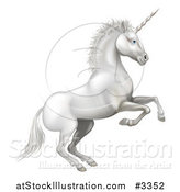 Vector Illustration of a White Rearing Unicorn by AtStockIllustration