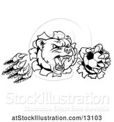 Vector Illustration of Black and White Vicious Aggressive Bear Mascot Slashing Through a Wall with a Soccer Ball in a Paw by AtStockIllustration