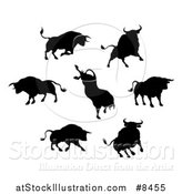 Vector Illustration of Black Silhouetted Bulls by AtStockIllustration