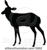 Vector Illustration of Black Silhouetted Deer Doe by AtStockIllustration