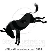 Vector Illustration of Black Silhouetted Donkey Bucking by AtStockIllustration
