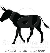 Vector Illustration of Black Silhouetted Donkey by AtStockIllustration