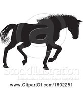 Vector Illustration of Black Silhouetted Horse by AtStockIllustration