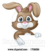 Vector Illustration of Cartoon Easter Bunny Rabbit Sign by AtStockIllustration