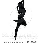 Vector Illustration of Dancing Lady Silhouette by AtStockIllustration