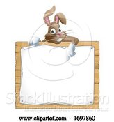 Vector Illustration of Easter Bunny Rabbit Peeking over Sign Pointing by AtStockIllustration