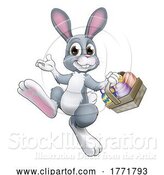 Vector Illustration of Easter Bunny Rabbit with Easter Egg Basket by AtStockIllustration