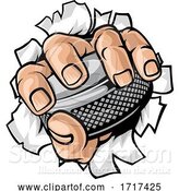 Vector Illustration of Hand Holding Ice Hockey Puck by AtStockIllustration