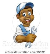 Vector Illustration of Happy Cartoon Black Male Plumber Holding a Spanner Wrench Around a Sign by AtStockIllustration