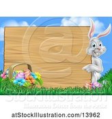 Vector Illustration of Happy White Easter Bunny Rabbit Pointing Around a Wood Sign Against Sky by AtStockIllustration
