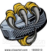 Vector Illustration of Hockey Puck Ball Eagle Claw Monster Hand by AtStockIllustration
