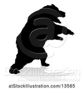 Vector Illustration of Silhouetted Bear with a Reflection or Shadow, on a White Background by AtStockIllustration
