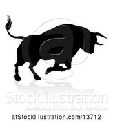 Vector Illustration of Silhouetted Black Bull Charging, with a Shadow on a White Background by AtStockIllustration