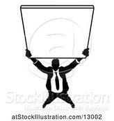 Vector Illustration of Silhouetted Businessman Holding up a Sign by AtStockIllustration