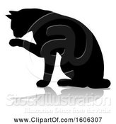 Vector Illustration of Silhouetted Cat Grooming, with a Shadow or Reflection, on a White Background by AtStockIllustration