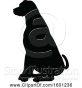 Vector Illustration of Silhouetted Dog by AtStockIllustration
