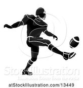 Vector Illustration of Silhouetted Football Player Kicking by AtStockIllustration