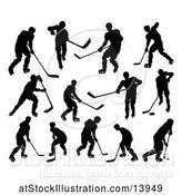 Vector Illustration of Silhouetted Hockey Players by AtStockIllustration