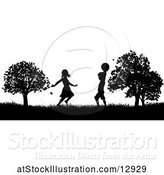 Vector Illustration of Silhouetted KChildren Playing in a Park by AtStockIllustration