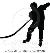 Vector Illustration of Silhouetted Male Ice Hockey Player by AtStockIllustration