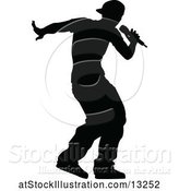 Vector Illustration of Silhouetted Male Singer by AtStockIllustration