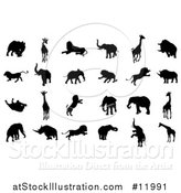 Vector Illustration of Silhouetted Safari Animals by AtStockIllustration