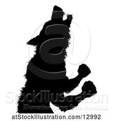 Vector Illustration of Silhouetted Werewolf Beast Howling and Transforming by AtStockIllustration