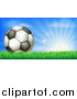 Vector Illustration of a 3d Soccer Ball in Grass at Sunrise by AtStockIllustration