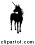 Vector Illustration of a Black Silhouetted Mythical Unicorn Standing and Looking to the Left by AtStockIllustration